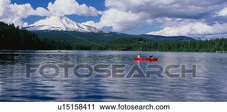This is snow capped Mount Hood and Trillium. There is a canoeist in a red canoe on the lake. View Large Photo Image Stock Image - This is snow capped Mount Hood and Trillium. There is a canoeist in a red canoe on the lake.. Fotosearch