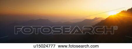 Stock Photo - This is sunset at Moro Rock. It is the view toward the central valley.. Fotosearch