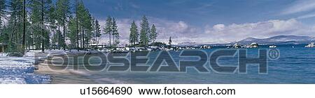 This is the sandy beach at Lake Tahoe. It shows the turquoise water in the winter after a snow storm. View Large Photo Image Stock Image - This is the sandy beach at Lake Tahoe. It shows the turquoise water in the winter after a snow storm.. Fotosearch