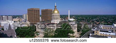 Stock Photograph - This is the State Capitol and skyline in daylight. Fotosearch