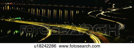 This is the Theodore Roosevelt Bridge over the Potomac River at night View Large Photo Image Stock Photograph - This is the Theodore Roosevelt Bridge over the Potomac River at night. Fotosearch