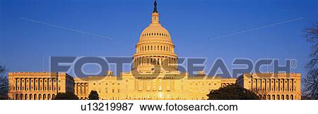 This is the U. S. Capitol at sunset. It is set against a blue sky. View Large Photo Image Stock Photo - This is the U. S. Capitol at sunset. It is set against a blue sky.. Fotosearch