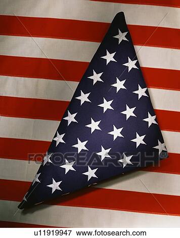 Stock Photo - This shows a triangularly folded American. Fotosearch