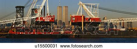 Stock Image - This shows the World Trade Towers as seen from New Jersey. Fotosearch
