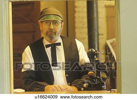 Ticket taker in full costume at Standard Gauge Steam Train attraction View Large Photo Image Stock Photo - Ticket taker in full costume at Standard Gauge Steam Train attraction. Fotosearch