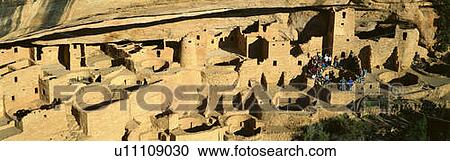 Stock Image - Tourists At Cliff Palace, Mesa Verde National Park, Colorado. Fotosearch