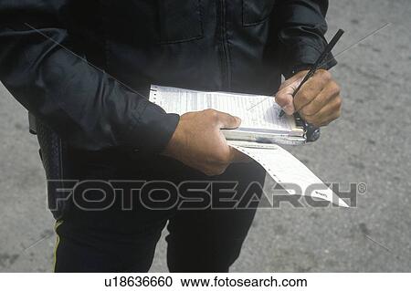Traffic cop writing ticket View Large Photo Image Stock Image - Traffic cop writing ticket. Fotosearch