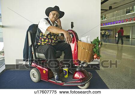 Traveler at an international airport View Large Photo Image Stock Photography - Traveler at an international airport. Fotosearch