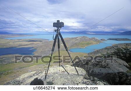 Tripod and camera on hill top near El Calafate, Patagonia, Argentina View Large Photo Image Picture - Tripod and camera on hill top near El Calafate, Patagonia, Argentina. Fotosearch