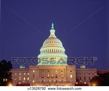 Stock Image - U. S. Capitol Building at night, Washington, D. C.. Fotosearch