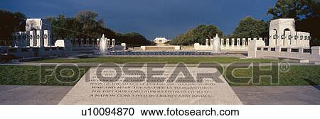 Stock Image - U. S. World War II Memorial commemorating World War II in Washington D. C. at sunrise. Fotosearch