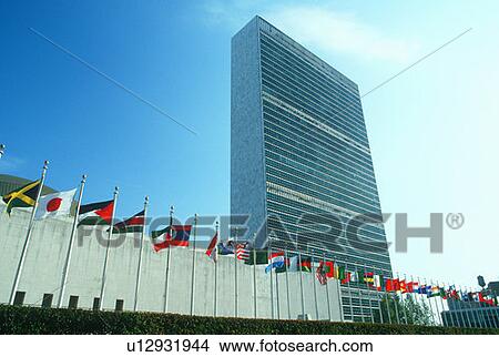 United Nations Building with flags in New York City, New York View Large Photo Image Picture - United Nations Building with flags in New York City, New York. Fotosearch