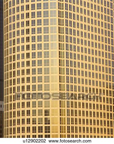 Stock Image - Urban windows at sunset, Los Angeles, California. Fotosearch