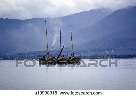 Stock Photo - View of Erhai Lake and Cangshan Mountains in Dali. Fotosearch