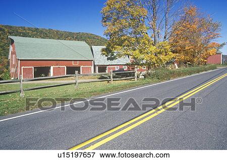 Stock Photo - View of farm buildings from road. Fotosearch