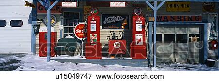 Vintage gas station with old style pumps View Large Photo Image Stock Photo - Vintage gas station with old style pumps. Fotosearch