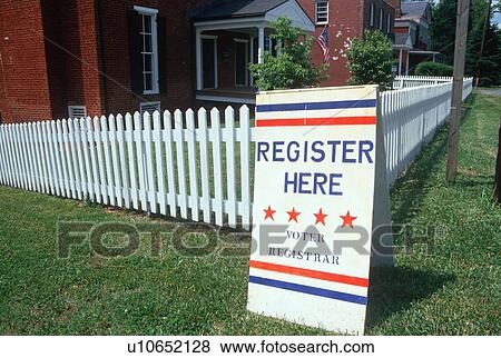 Voter registration sign with white picket fence View Large Photo Image Stock Photo - Voter registration sign with white picket fence. Fotosearch