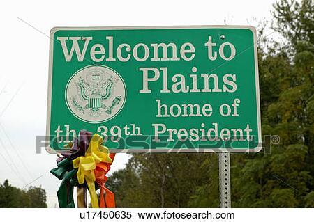 Stock Photography - ? Welcome to Plains? sign. Fotosearch
