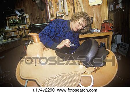Woman making custom made western saddle View Large Photo Image Stock Image - Woman making custom made western saddle. Fotosearch