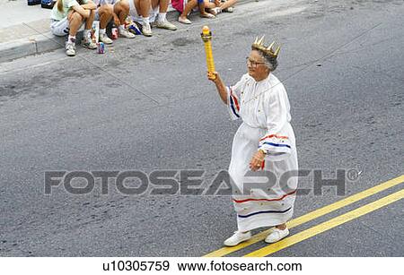 Stock Photo - Woman Marching in July 4th Parade. Fotosearch