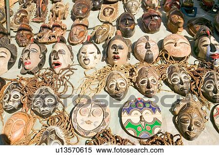 Stock Photography - Wooden African masks for sale in Cape Town, South Africa. Fotosearch