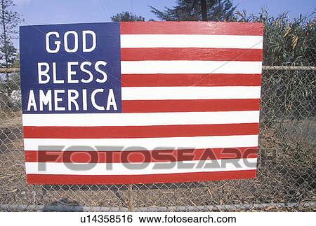 Stock Photograph - Wooden American Flag on Chain Link Fence. Fotosearch