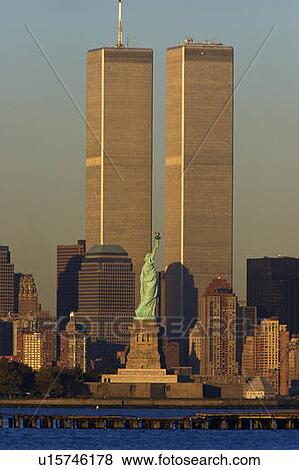 World Trade Towers and Statue of Liberty at sunset View Large Photo Image Stock Photo - World Trade Towers and Statue of Liberty at sunset. Fotosearch