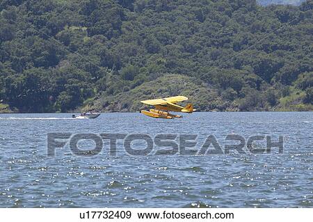 Yellow amphibious seaplane View Large Photo Image Stock Photo - Yellow amphibious seaplane. Fotosearch