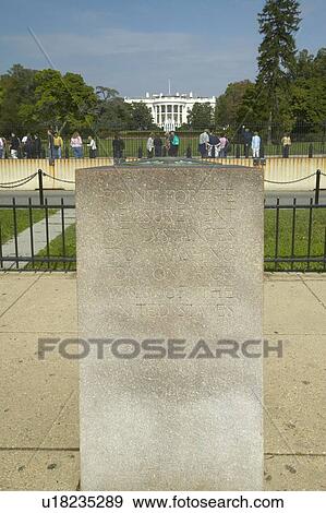 Stock Photo - 0 Milepost near White House in Washington D. C., mileage marker for U. S. Roads. Fotosearch