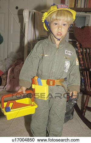 A boy dressed as a construction worker View Large Photo Image Stock Image - A boy dressed as a construction worker. Fotosearch