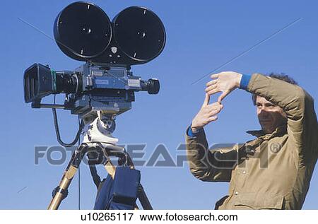 A cinematographer setting up his shot, Los Angeles, CA View Large Photo Image Stock Photo - A cinematographer setting up his shot, Los Angeles, CA. Fotosearch