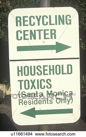 Picture - A green street sign designating recycling areas. Fotosearch