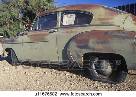 Stock Image - A not for sale used car in Barstow, California. Fotosearch