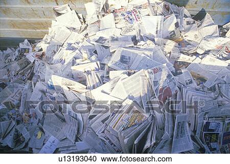 A pile of newspaper waiting for recycling in a bin View Large Photo Image Stock Image - A pile of newspaper waiting for recycling in a bin. Fotosearch