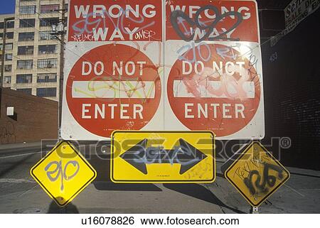 A sign that reads “Do not enter, wrong way” View Large Photo Image Stock Photograph - A sign that reads “Do not enter, wrong way”. Fotosearch