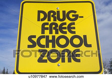 Stock Photo - A sign that reads “Drug free school zone”. Fotosearch
