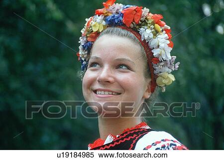 Stock Photography - A teenage girl in traditional Slavic costume. Fotosearch