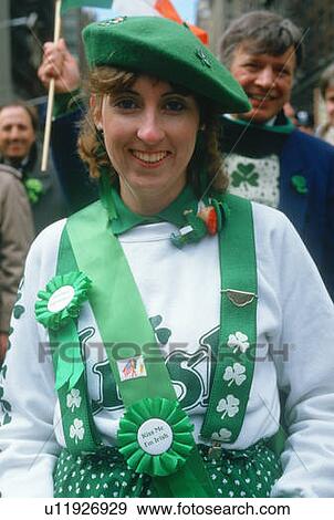 Stock Photo - A young woman dressed as Irish. Fotosearch