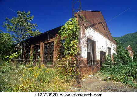 Abandoned building with broken windows View Large Photo Image Stock Image - Abandoned building with broken windows. Fotosearch
