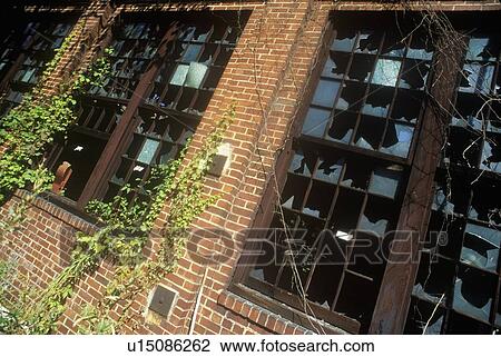 Abandoned building with broken windows View Large Photo Image Stock Image - Abandoned building with broken windows. Fotosearch