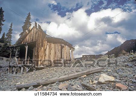 Abandoned wooden cabin on hillside View Large Photo Image Picture - Abandoned wooden cabin on hillside. Fotosearch