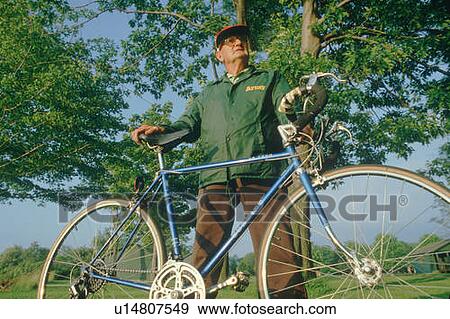 An active senior citizen and his bicycle View Large Photo Image Stock Photo - An active senior citizen and his bicycle. Fotosearch