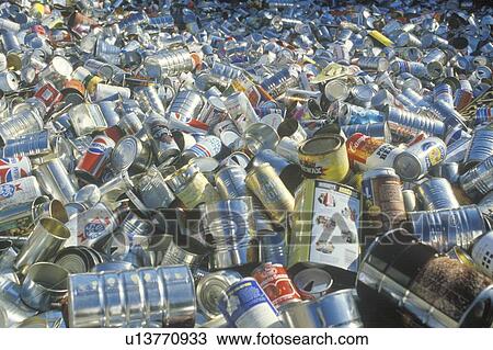 Stock Image - An assortment of empty aluminum cans waiting for recycling. Fotosearch