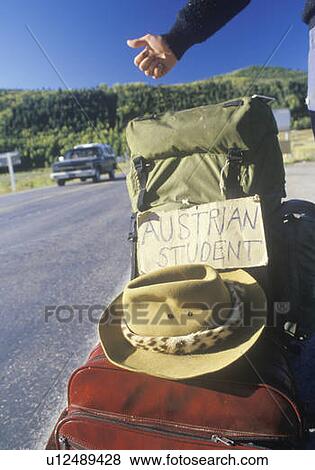 Stock Photo - An Austrian student hitchiking out of Telluride, CO. Fotosearch