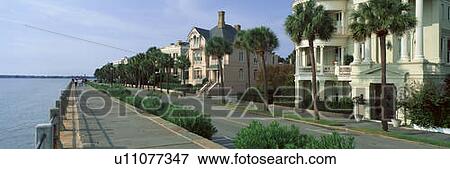 Stock Photo - Atlantic Ocean with historic homes of Charleston, SC. Fotosearch