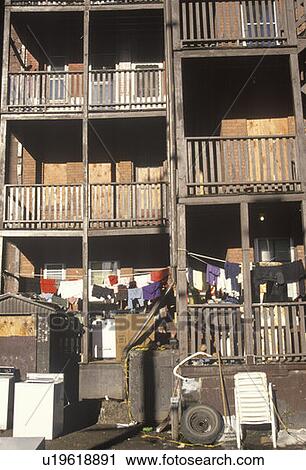 Back porches of decaying apartment housing View Large Photo Image Stock Image - Back porches of decaying apartment housing. Fotosearch