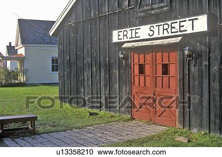 Stock Image - Barn at Erie Street in Erie Canal Village, Rome, NY. Fotosearch