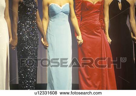 Beauty pageant contestants wearing gowns and holding hands View Large Photo Image Stock Photo - Beauty pageant contestants wearing gowns and holding hands. Fotosearch