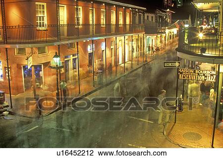 Stock Image - Bourbon Street at Night, New Orleans, Louisiana. Fotosearch