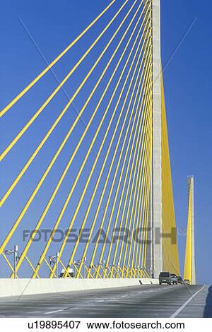 Stock Photo -  Cars driving over the Sunshine Skyway Bridge, Tampa, Florida. Fotosearch